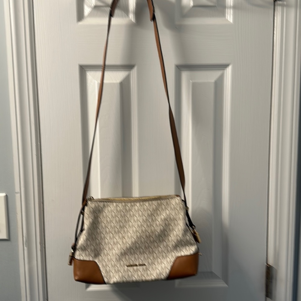 Michael Kors bag with dust cover.